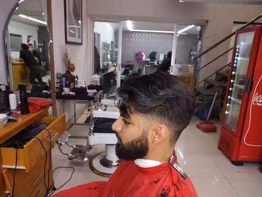 Checo&rsquo;s peluquer&iacute;a y estilismo