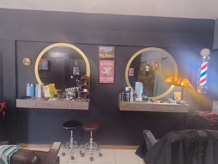 Cuervo barber&iacute;a y peluqueria