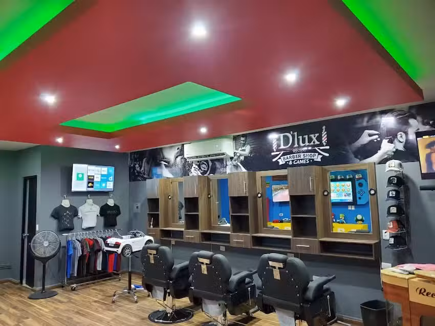 D&rsquo;lux barber shop & games