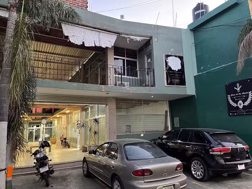 La casa de los leones barberia