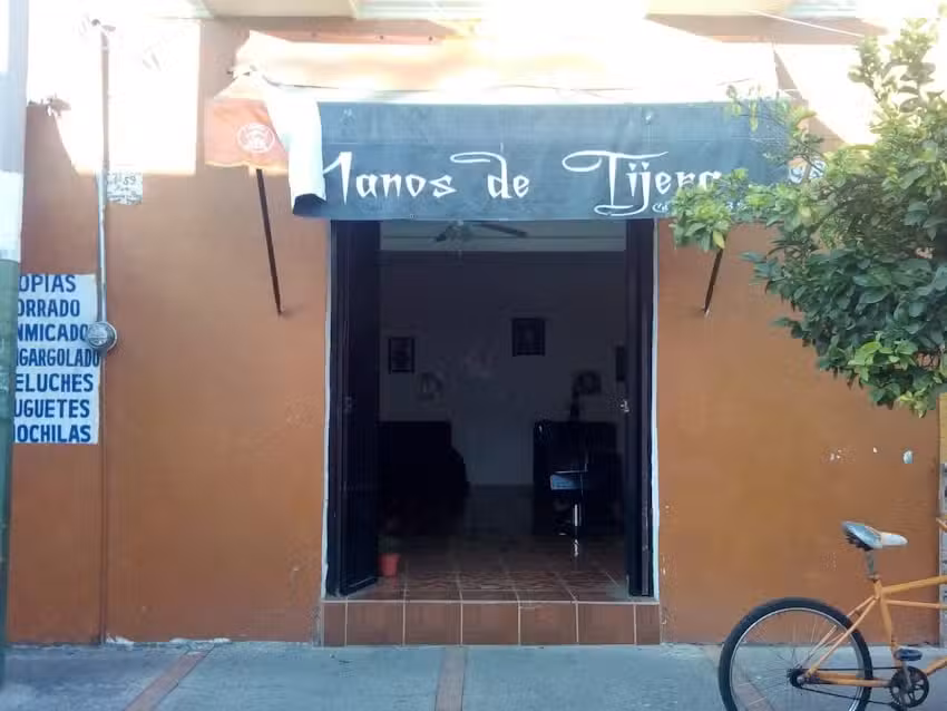 PELUQUERIA MANOS DE TIJERA